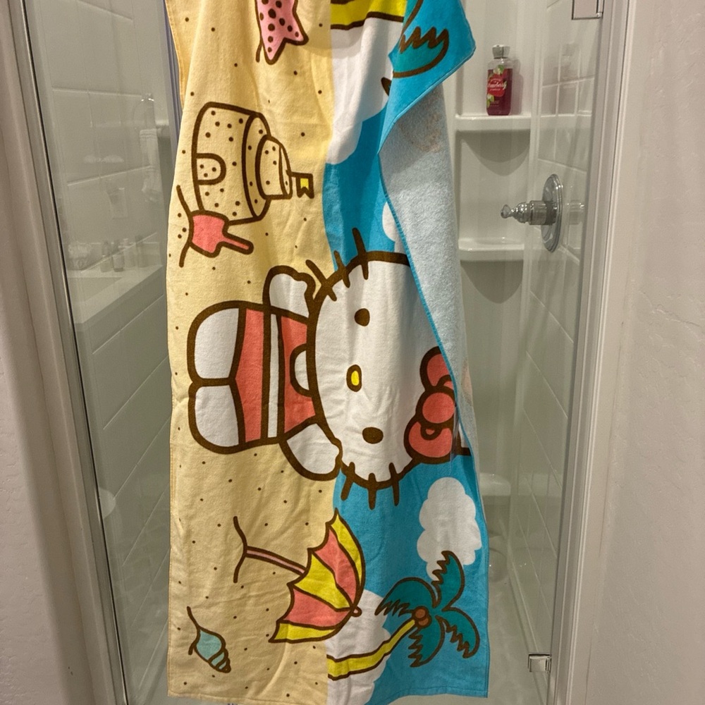 Hello Kitty Pink Beach Towel with Blue and Yellow Accents